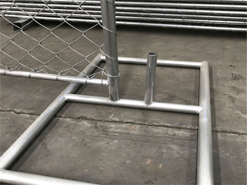 Galvanized stands installed with temporary chain link fence