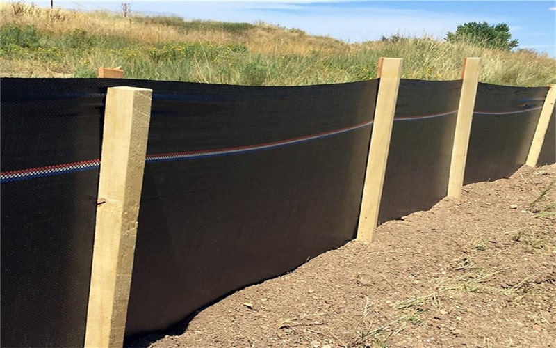 silt fence installed with hardwood