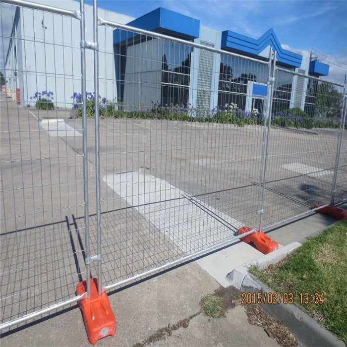 Temporary fencing installed in front of building