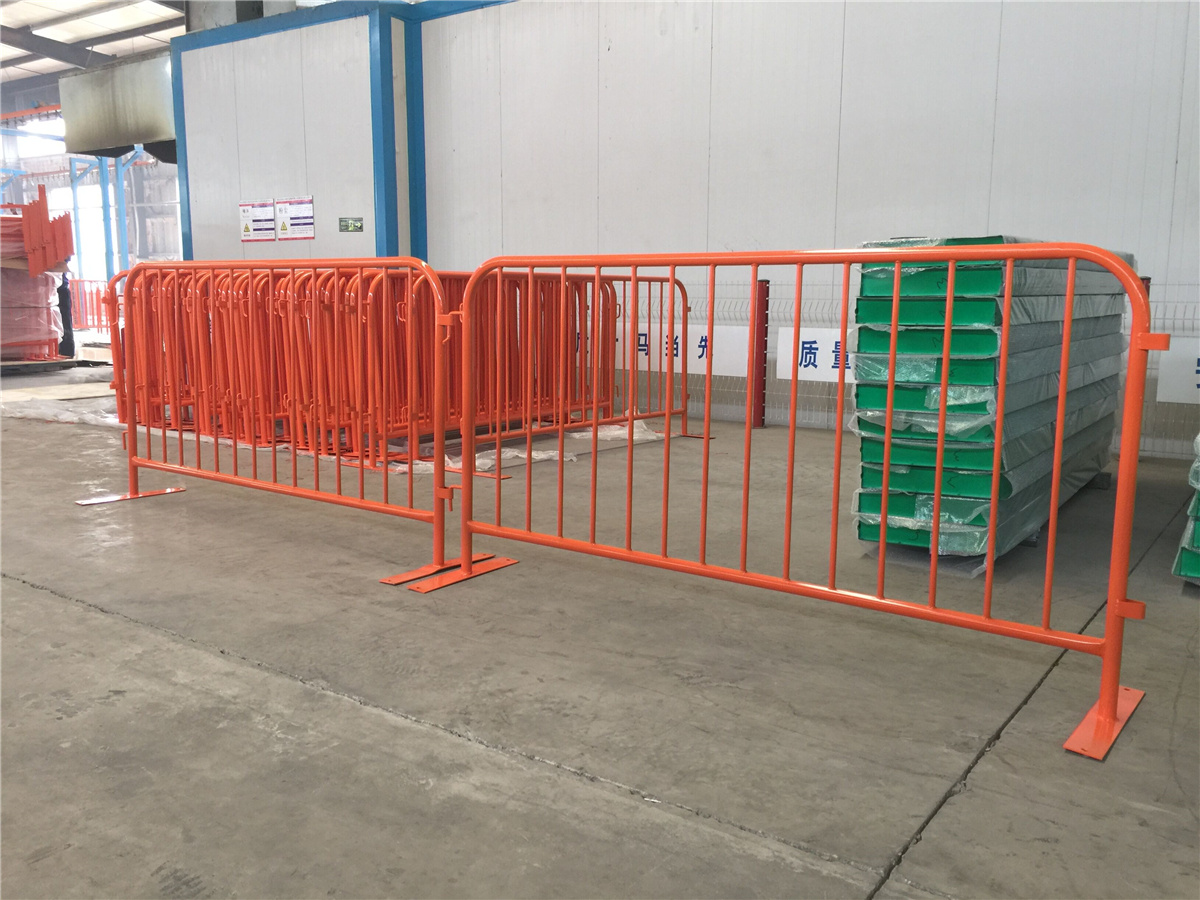 powder coated orange steel barricade with flat base