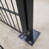 The powder coated black post baseplate for double wire fence