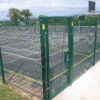 The green gate of double loop fencing