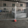 The construction fencing installed in our workshop with feet and clamps.