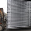 The temporary pool fencing packed in steel pallet are deliveryed by a forklift.