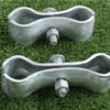 two sets of galvanised steel clamps