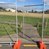 The temporary gate with clamps and feet
