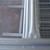 The flatten horizontal rail of site fencing