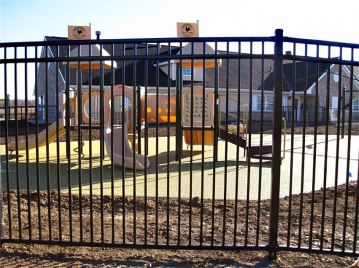 The corrugated metal panel fence installed around a kindergarten.