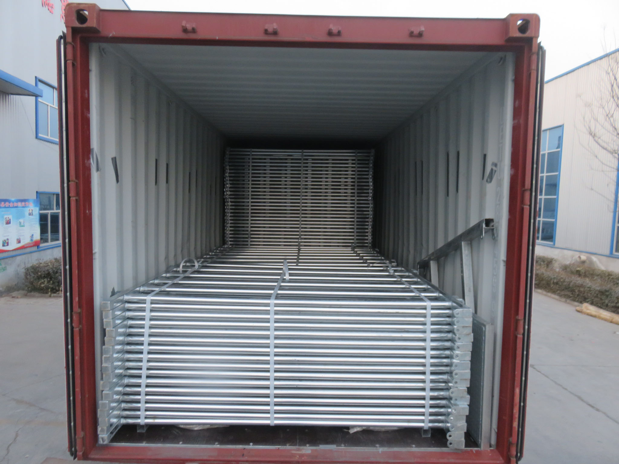 The corral panels are loaded into container