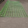 The green roll top fence panels