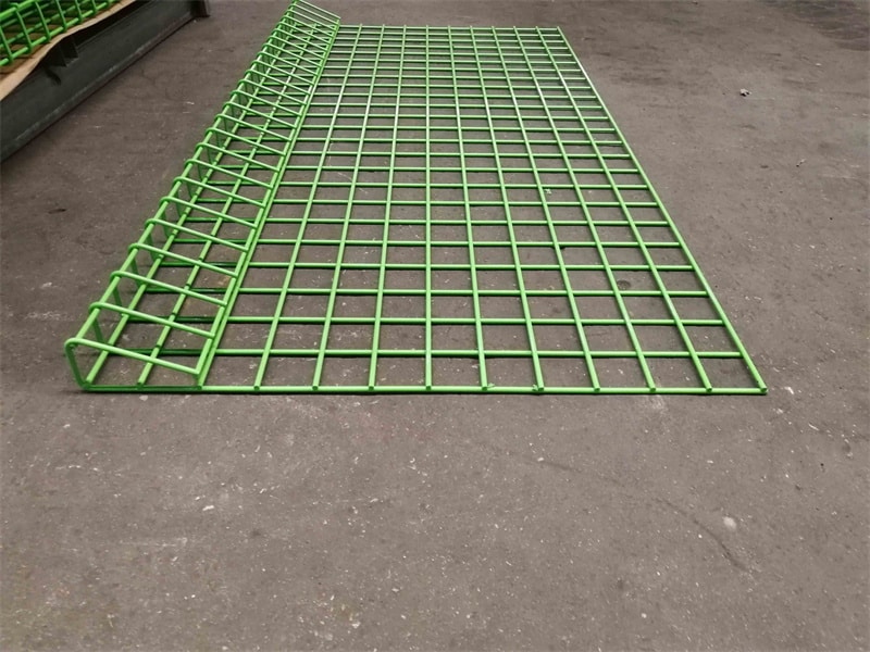 The green roll top fence panels