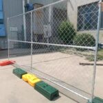 temporary chain link fence panel installed with feet