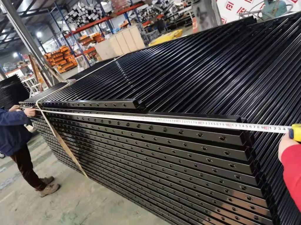 Tubular steel security fences in a factory.