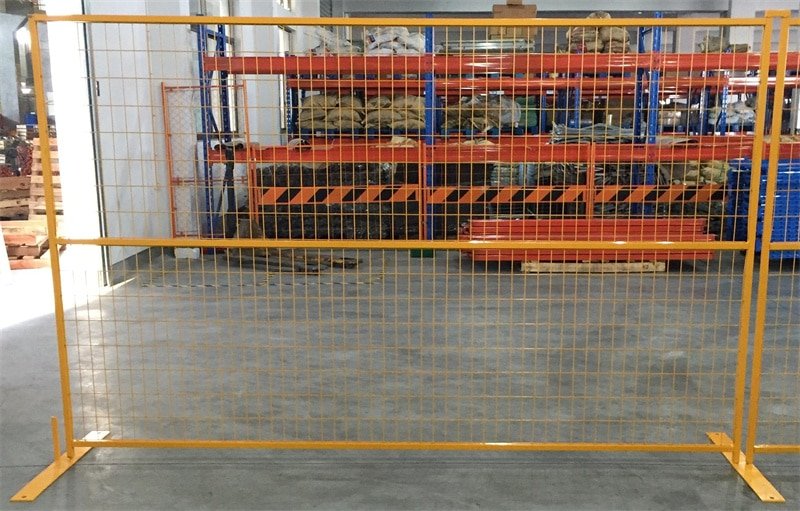 a powder coated yellow Canadian construction fence 