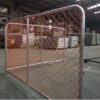 The orange barriers installed on the factory ground.