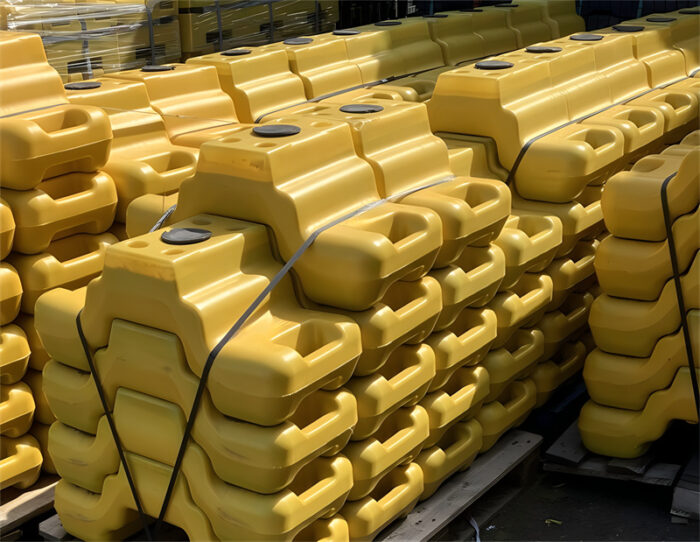 Many of the yellow heras step blocks are packaged in pallets.