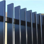 Discover our premium aluminium blade fence featuring a stylish vertical design for gardens. This architectural masterpiece offers privacy and elegance with perfect spacing.