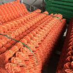 Enhance your construction site safety with our durable 4 ft. x 100 ft. orange safety barrier fence panel. Get the best protection and create effective visual barricades today!