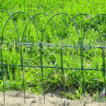 Enhance your landscape with our decorative wire garden edging fences. Perfect for lawn borders, these PVC-coated and wrought iron options add charm and durability.