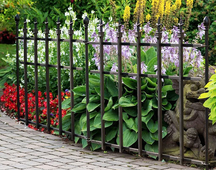 Explore 30 creative decorative garden fence ideas to enhance your outdoor space. Discover unique styles, from wire fences to elegant designs for vegetable gardens!