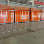 Several completed steel barriers on display in a warehouse, ready for inspection or packaging.