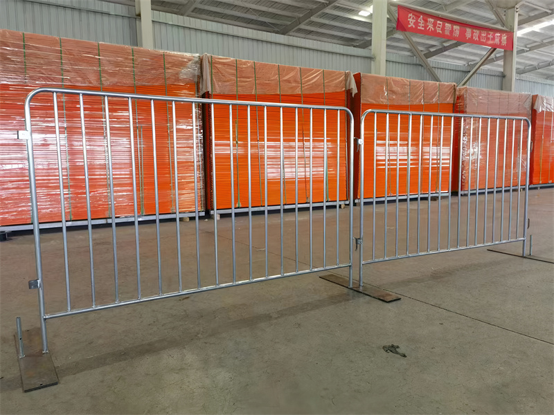 Several completed steel barriers on display in a warehouse, ready for inspection or packaging.