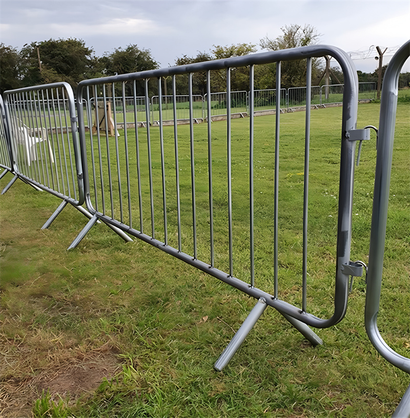 A comprehensive view of a steel barricade in an outdoor area, with close-up images of its components, including the connector and base plate.