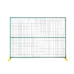 A single green welded wire mesh temporary fence panel with yellow flat feet, isolated on a white background.