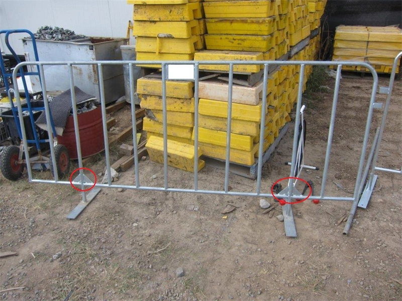 DB Fencing's temporary metal crowd control barrier with dual base optionsstandard flat base and wheeled base with red protective capsmanufactured in Anping, China, designed for event and construction site security.