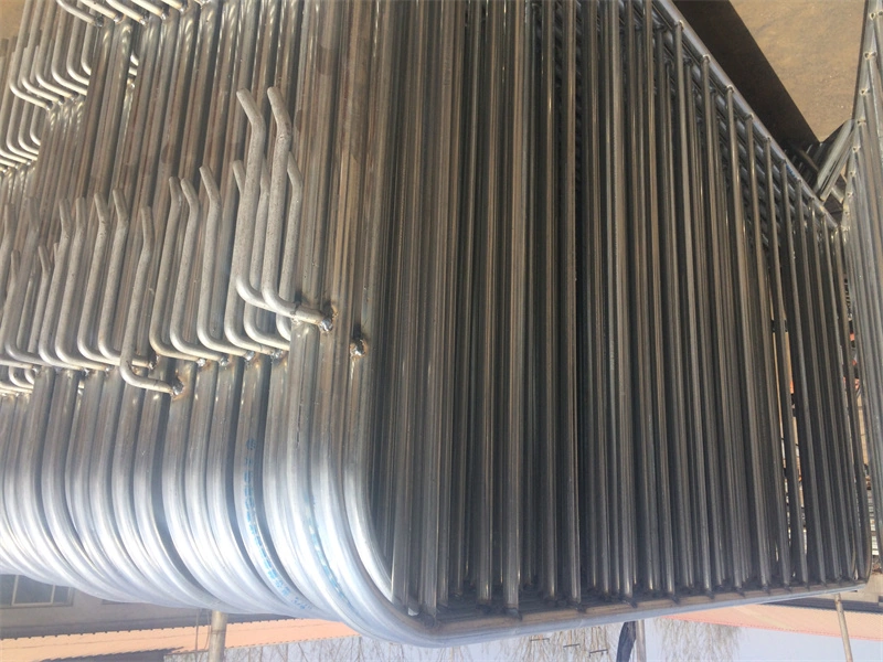 Stack of galvanized steel crowd control barriers from DB Fencing, featuring durable hot-dipped galvanized finish designed for temporary site security and event crowd control, manufactured in Anping, China with compliance to AS 4687-2022/2007 and ISO9001/SGS certification.