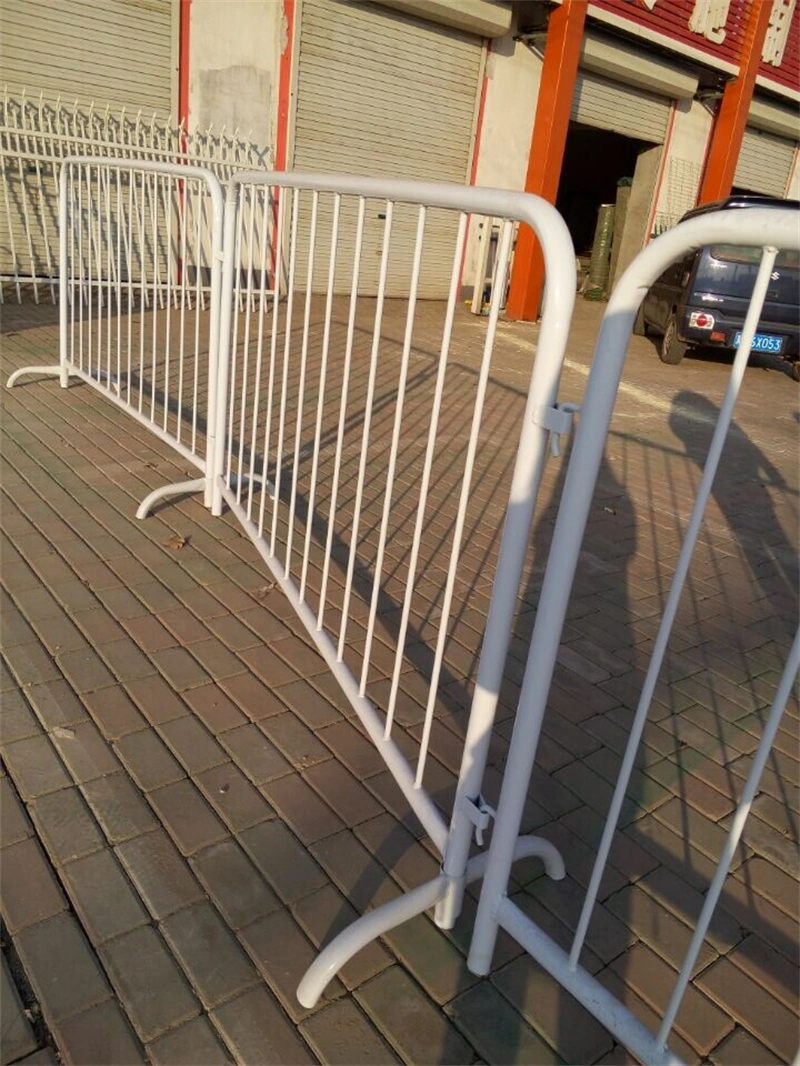 White metal crowd control barriers from DB Fencing, a leading wire mesh manufacturer, featuring durable galvanized finishes for temporary site security and event crowd management.