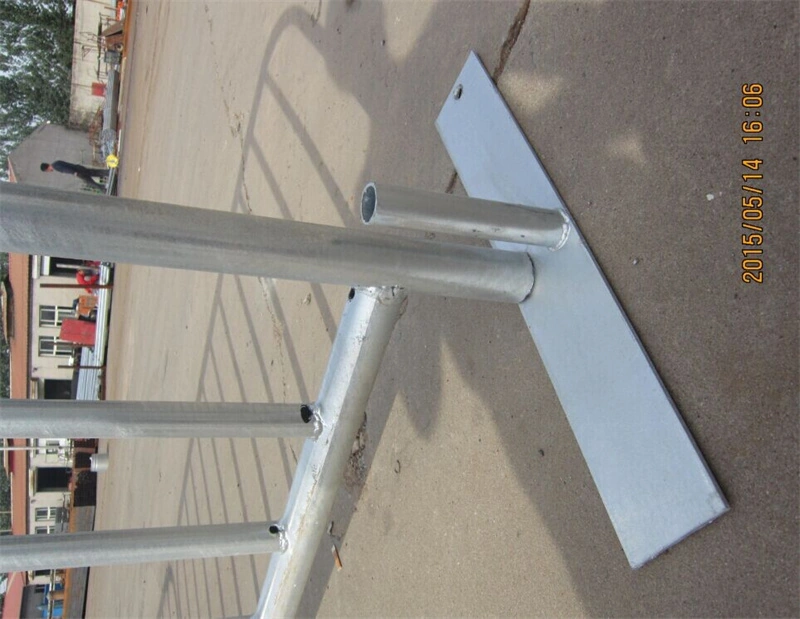 Close-up of a galvanized metal crowd control barrier base from DB Fencing, featuring durable cylindrical pipes and a flat mounting plate, designed for temporary site security and event crowd management.