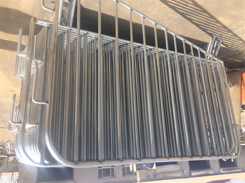 Stack of DB Fencing's hot-dipped galvanized crowd control barriers, designed for durable event crowd management and construction site security, showcasing bulk manufacturing capacity for efficient distribution.