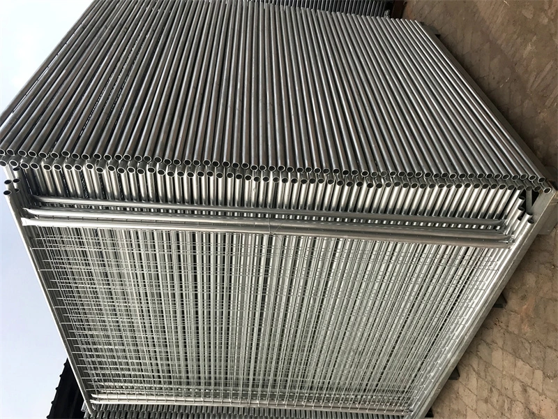 Stack of hot-dipped galvanized temporary fence panels, manufactured by DB Fencing, designed for construction sites, events, and agricultural useshowcasing durable, AS4687-compliant fencing solutions from a leading one-stop wire mesh manufacturer.