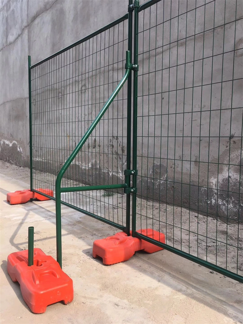 Green temporary wire mesh fence with gate and orange plastic feet, manufactured by DB Fencinga leading one-stop wire mesh fence supplier with 14 years of export experience, offering durable, AS4687-compliant temporary fencing for construction sites and events.