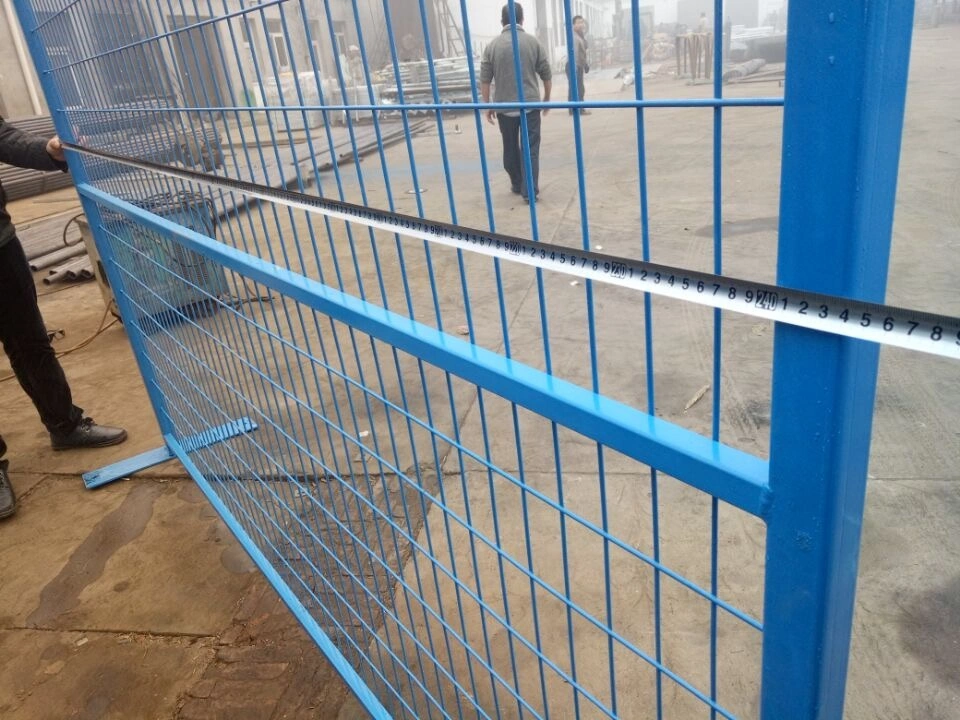 Blue powder coated fence panels with welded mesh for construction site security