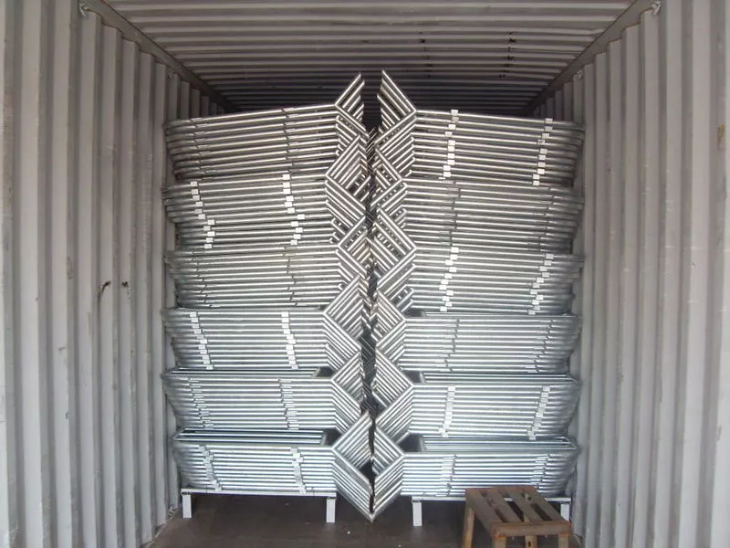 A shipping container filled wall-to-wall with neatly stacked, hot-dipped galvanized Crowd Control Barriers manufactured by DB Fencing, signifying efficient bulk export logistics. These durable barriers, designed for events and public safety, are ready for international shipment from our Anping facility to global markets.