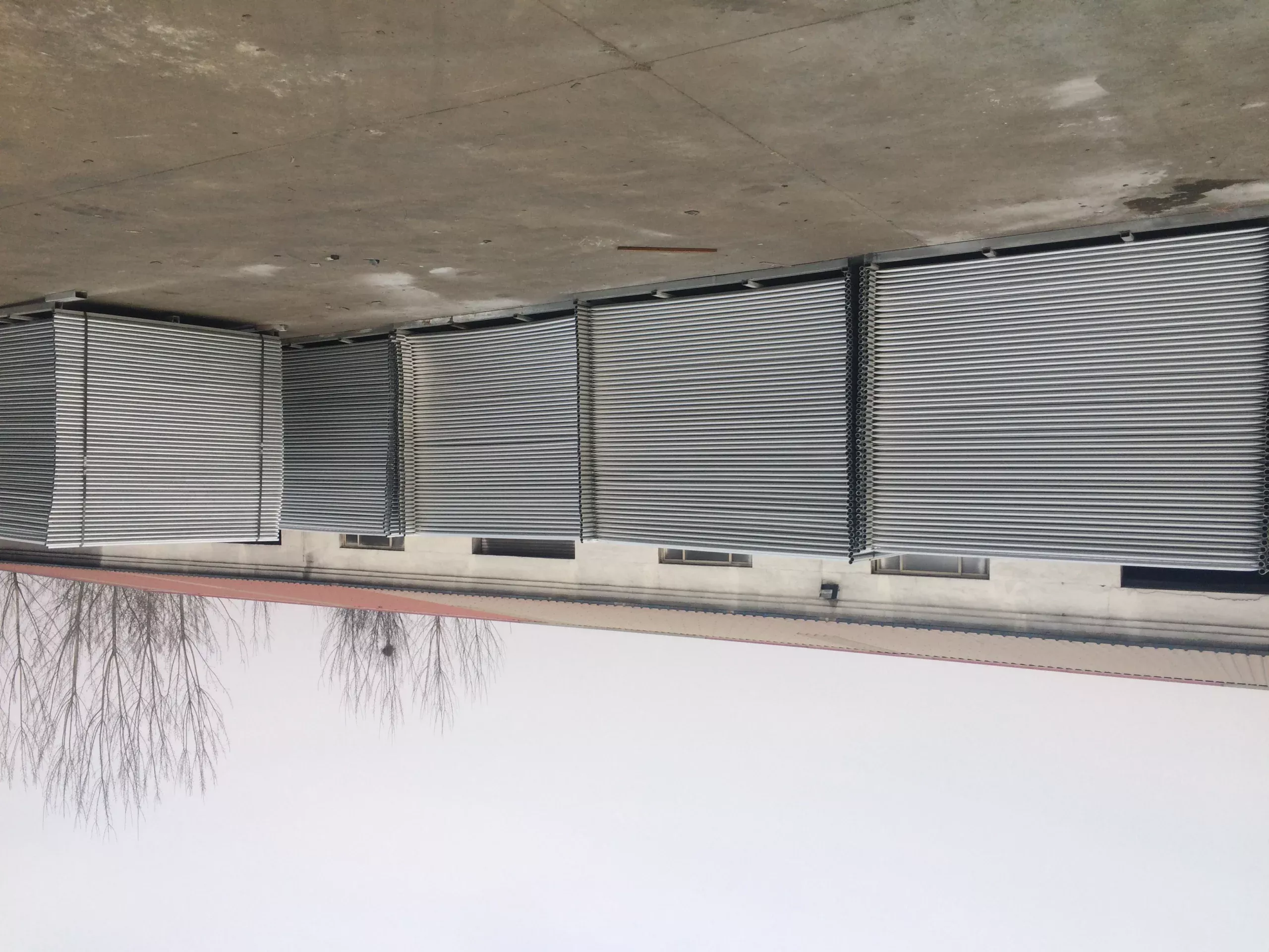 Large stacks of hot-dipped galvanized steel tubes, showcasing DB Fencing's robust production capacity for the temporary fence accessories and component ecosystem. These durable elements are ready for integration into high-quality temporary fencing solutions for construction sites and events.
