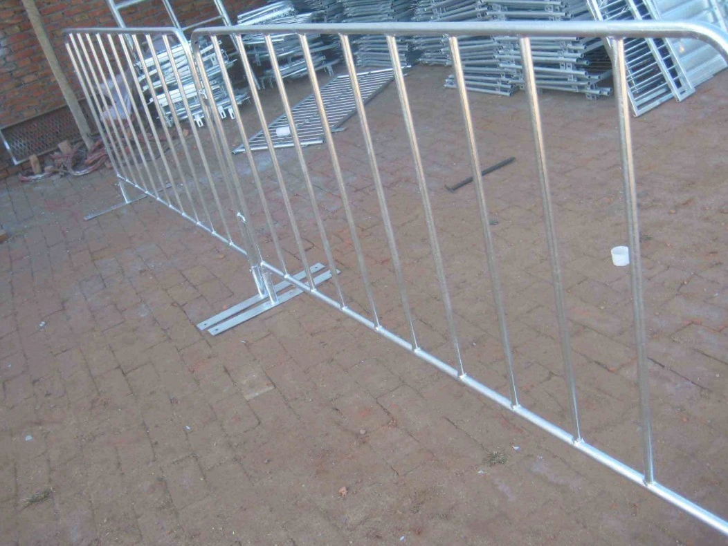 An array of hot-dipped galvanized steel crowd control barriers from DB Fencing, featuring robust construction and stable flat feet, ideal for event management and public safety. These high-quality barriers are produced for export, meeting the rigorous demands of construction and event companies globally.