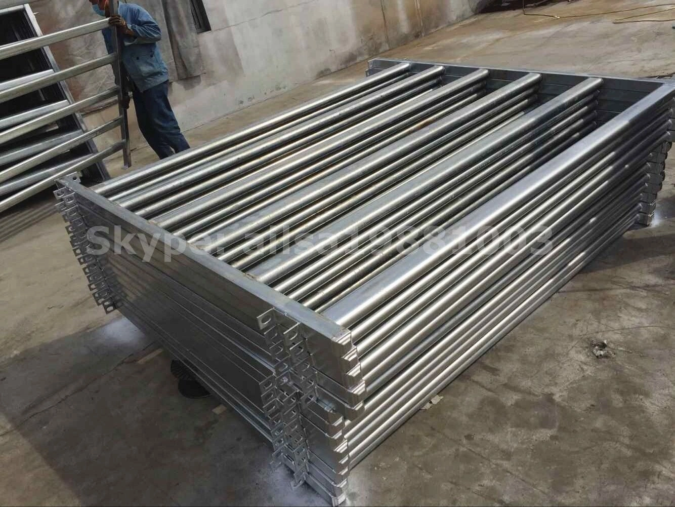 Hot-dipped galvanized cattle panels manufactured by Anping Deban Metal Wire Mesh Products Co., Ltd, ready for construction site security and livestock farming.
