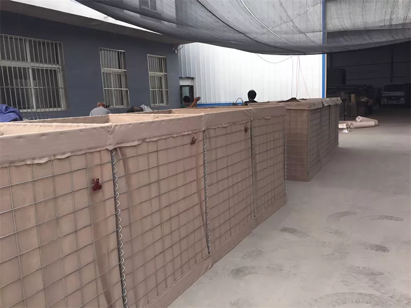 DB Fencing manufactures industrial Hesco Barriers using high-grade steel wire mesh for crowd control and construction site security. These welded metal gabion units demonstrate our production capacity for global fencing distributors.