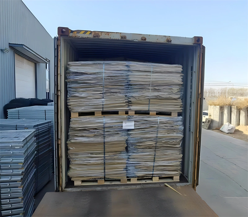 DB Fencing's Hesco Barriers factory-direct loading for international export, demonstrating efficient B2B logistics and secure container packing for heavy-duty defense and civil engineering projects.