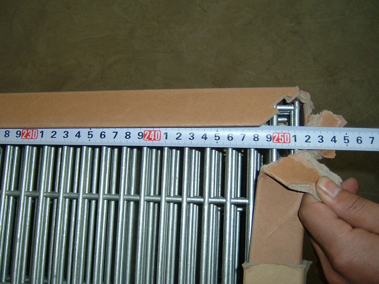 Anping Deban Metal Wire Mesh Products Co., Ltd manufacturing high-quality steel panels for our Hesco Barriers. This detailed specification view supports our comprehensive buyer's guide on sizing and durability for temporary and permanent fencing solutions.