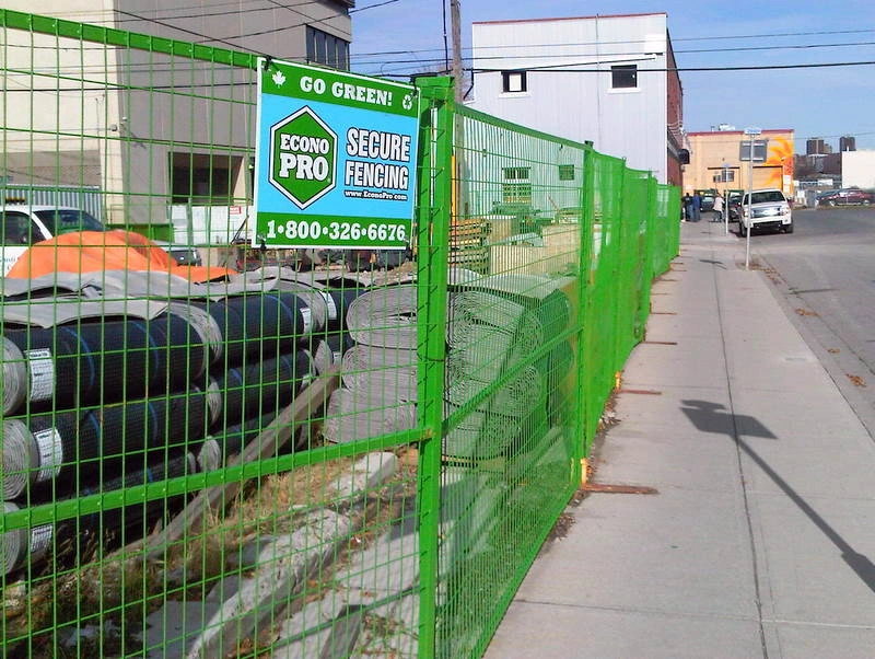 DB Fencing installs durable high-strength security fencing for a Canadian industrial site, providing robust perimeter protection with bright green coated mesh.