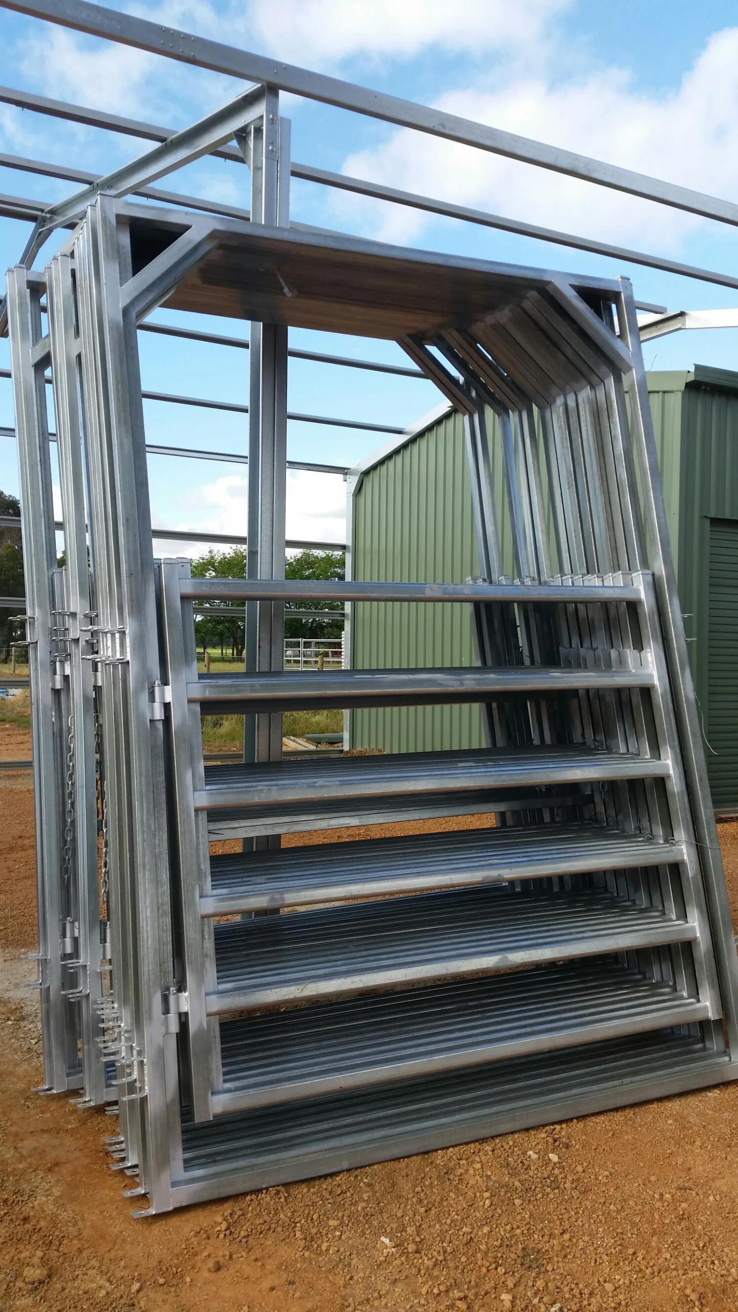 Stacked hot-dipped galvanized cattle panels manufactured by DB Fencing for secure livestock enclosures. These high-strength steel panels are produced in Anping and ship globally to meet Australian Standard AS 4687.