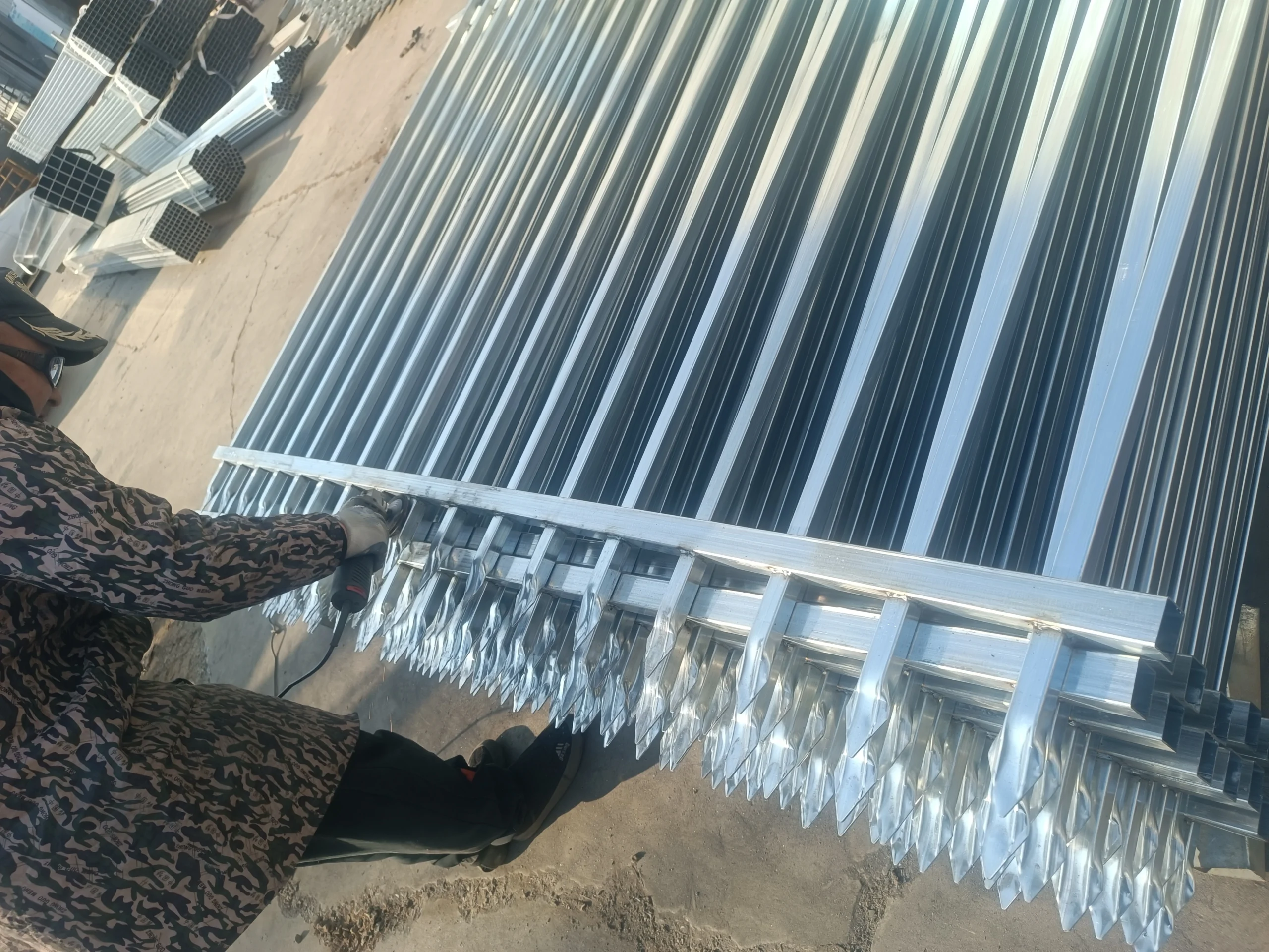 DB Fencing factory-direct safety fencing panels with sharp spikes, featuring hot-dipped galvanized finishes for durable, long-lasting construction site security.