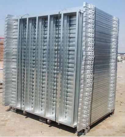 This image shows a large industrial pallet of hot-dipped galvanized steel cattle panels manufactured by DB Fencing. These durable corrals are ready for export to meet Australian standards and construction site requirements.