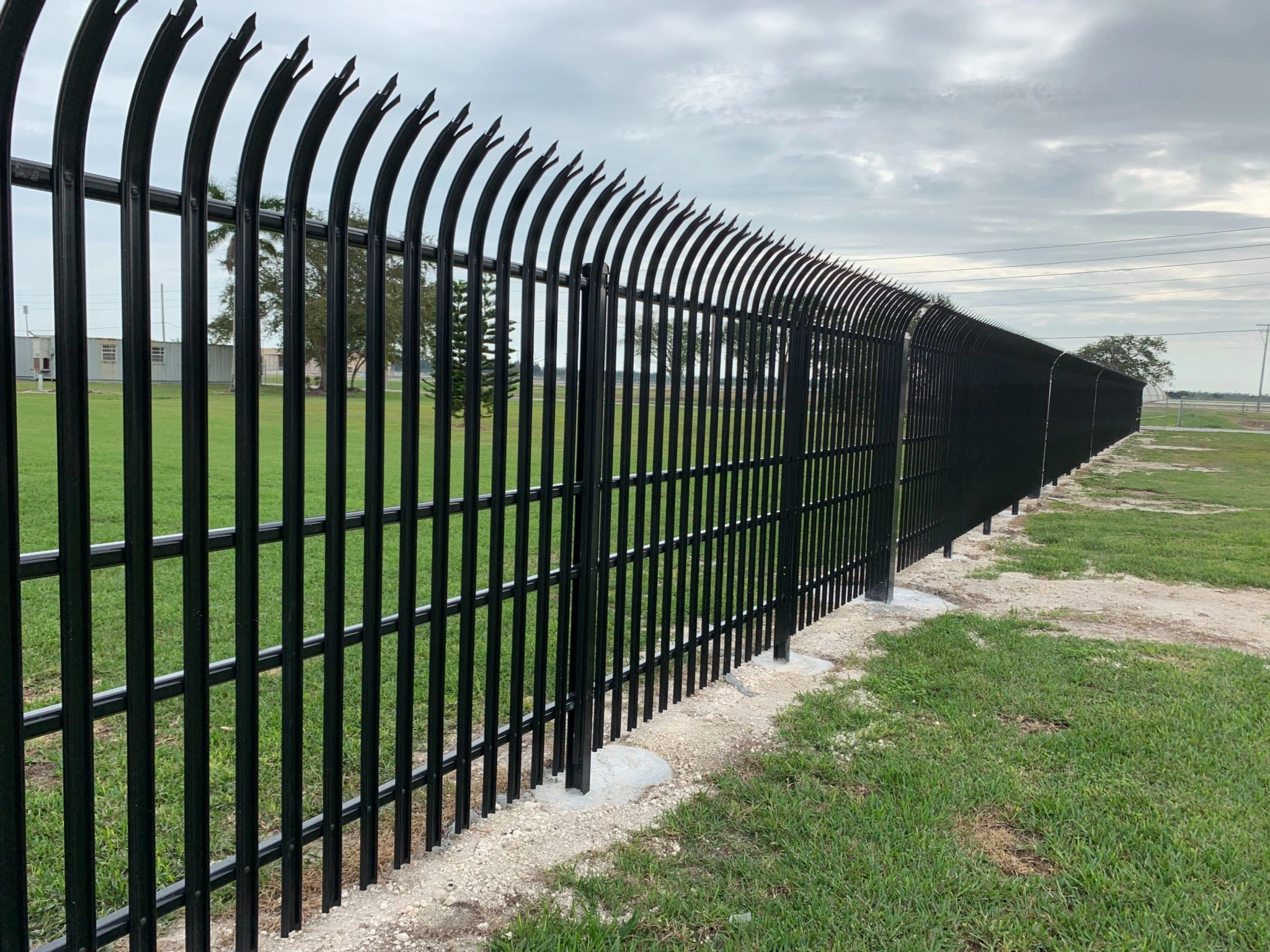 DB Fencing supplies high-quality steel Security Fencing featuring anti-climb spool tops and hot-dipped galvanized steel for robust perimeter security. Designed for strict compliance and durability, this black coated fence provides an effective permanent solution for commercial and industrial sites.